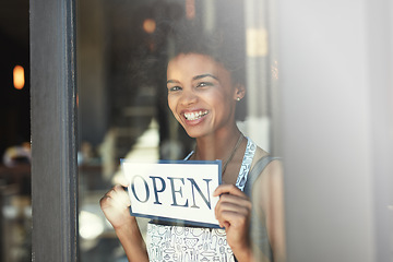 Image showing Cafe open sign, window portrait and happy woman with smile for retail service, restaurant welcome or coffee shop opening. Small business owner, board and person smiling for entrepreneur startup store