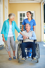 Image showing Wife, caregiver laughing or old man in wheelchair in hospital clinic helping an elderly patient for support. Funny, happy or healthcare nurse speaking or smiling with senior people with a disability