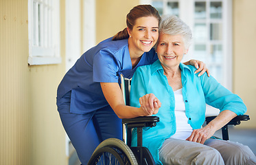 Image showing Portrait of nurse, hugging or old woman in wheelchair in hospital helping a senior patient for support. Holding hands, happy smile or healthcare caregiver smiling with an elderly lady with disability