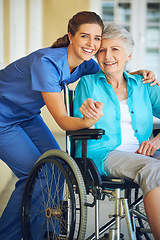 Image showing Portrait, caregiver or happy elderly woman in a wheelchair in hospital helping a mature patient for support. Smile, disabled or healthcare social worker smiling with a senior person with a disability