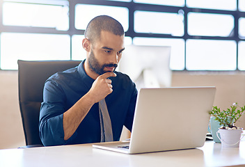 Image showing Laptop, idea and research with a business man in the office, working online to finish a project at his desk. Computer, thinking and email with a young male employee at work for company planning