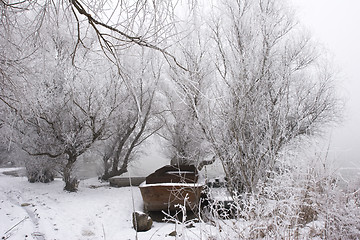 Image showing traditional fishing boats on river Danube mid winter