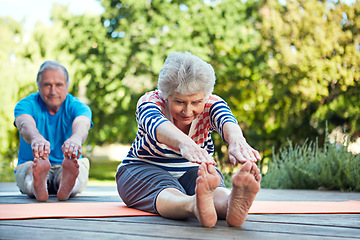 Image showing Nature, yoga stretching and senior couple start outdoor exercise, training workout or health fitness on park floor. Wellness, freedom and elderly marriage people, man or woman doing pilates warm up