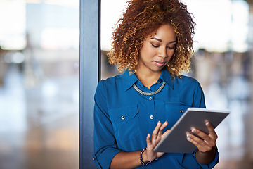 Image showing Corporate, young latino businesswoman with tablet and standing in office. Communication or networking, contact and mockup with black female worker on mobile device reading or writing email at work