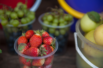 Image showing Red ripe strawberries in bucket