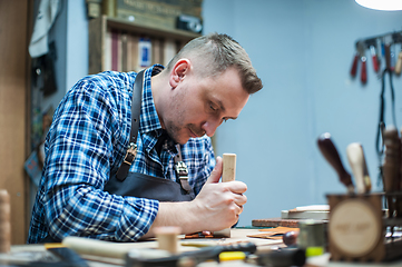 Image showing Concept of handmade craft production of leather goods.