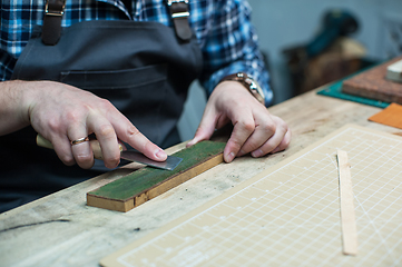 Image showing Concept of handmade craft production of leather goods.