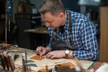 Image showing Concept of handmade craft production of leather goods.