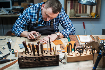 Image showing Concept of handmade craft production of leather goods.