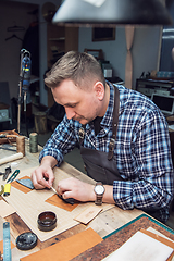 Image showing Concept of handmade craft production of leather goods.