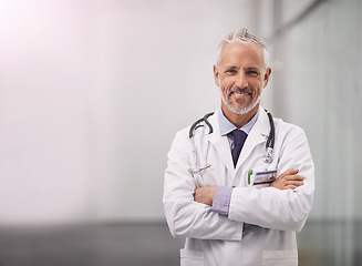 Image showing Doctor, healthcare and happy portrait of a man in a hospital with mockup space for health insurance. Professional male medical worker with a stethoscope for a consultation, healing and wellness