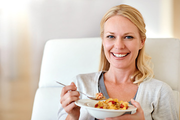 Image showing Happy woman, portrait smile and cereal for healthy breakfast, meal or morning diet in living room at home. Female person smiling with food bowl of wheat or corn flakes for health, nutrition or fiber