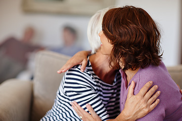 Image showing Woman, grandmother and hug on sofa in home with family, care and parent love or smile. Happiness, retirement and adult with elderly mom, together or reunion, hello and embrace and living room