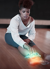 Image showing Woman, ankle pain or injury on floor at fitness studio with burnout or health problem. Female dancer or athlete with ice pack on red anatomy glow for arthritis, accident and feet while tired