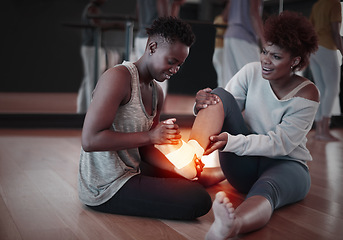 Image showing Feet, pain or injury and woman helping friend on floor at fitness studio with burnout or health problem. Female person with exercise partner and red anatomy glow for support, accident and first aid