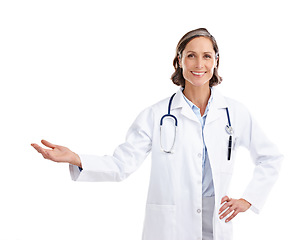 Image showing Portrait, woman smile and doctor with palm space in studio isolated on a white background. Healthcare professional, hand mockup and mature person with advertising, marketing or promotion for branding