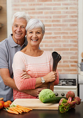 Image showing Cooking, happy and portrait of old couple in kitchen for salad, love and nutrition. Health, smile and retirement with senior man and woman cutting vegetables at home for food, dinner and recipe