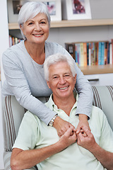 Image showing Happy senior couple, portrait and hug for love, romance or embrace in relationship or marriage together at home. Elderly woman hugging man with smile for loving, care and bonding in retirement