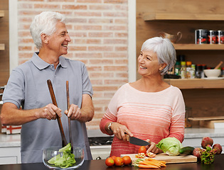 Image showing Cooking, health and happy of old couple in kitchen for salad, love and nutrition. Helping, smile and retirement with senior man and woman cutting vegetables at home for food, dinner and recipe