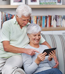 Image showing Senior couple, tablet and home on couch for social media, online news app and reading ebook. Happy old man, elderly woman and digital technology for subscription show, internet connection and website