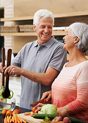 Image showing Cooking, health and laughing with old couple in kitchen for salad, love and nutrition. Happy, smile and retirement with senior man and woman cutting vegetables at home for food, dinner and recipe