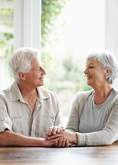 Image showing Happy senior couple holding hands in support, love and comfort together in retirement at home. Elderly man, old woman and smile with helping hand, trust and care for life partner, loyalty and respect