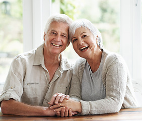 Image showing Portrait, laughing and senior couple holding hands for love, care and relax together at home. Face of happy old man, woman and helping hand for trust, support and loyalty to partner in retirement