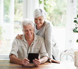 Image showing Tablet, happy old couple and online in home with social media, reading news app and ebook. Retirement, senior man and woman with digital technology for subscription, streaming and network connection