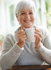 Image showing Portrait, happy old woman and cup of coffee in home for break, relaxing morning and retirement. Face, smile and senior lady drinking mug of warm beverage, tea time and happiness of good mood in house