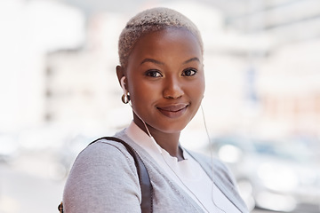 Image showing Portrait, smile and black woman with earphones, city and listening to music for motivation. Face, female person and girl outdoor, headphones and streaming sounds with confidence, audio and podcast