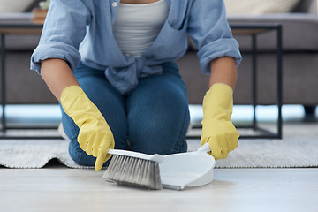 Image showing Closeup, hand broom and woman sweeping, home and spring cleaning with chores, maid and dirt. Zoom, female person and girl with housekeeping, cleaner and messy with dustpan, domestic lady and tidy