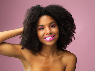 Image showing Face, hair care and happy black woman with makeup in studio isolated on a pink background with eyeshadow. Hairstyle portrait, lipstick cosmetics and African female model with salon treatment for afro