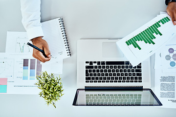 Image showing Man hands, documents and notebook writing, data analysis and website growth or planning on laptop or desk. Charts, graphs and stats paperwork of business person ideas, computer and seo research above