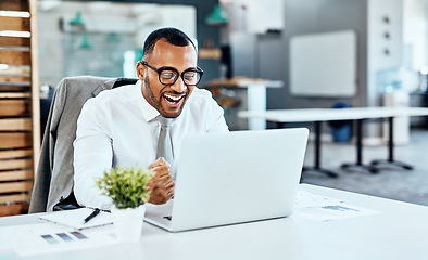 Image showing Business man, winning and excited on computer success, news or bonus celebration, cheers or wow in office. Happy, fist and winner, employee or person celebrate on laptop promotion, sales or results