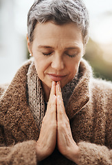 Image showing Senior woman is praying, hands with worship and religion, God with peace, gratitude and faith outdoor. Spiritual female person in nature with face, eyes closed and prayer for guidance and blessing