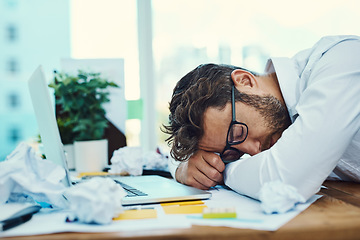 Image showing Man, tired and sleeping on office desk with burnout, fatigue and overworked business employee with glasses, documents and laptop. Businessman, lawyer and exhausted sleep in company workplace