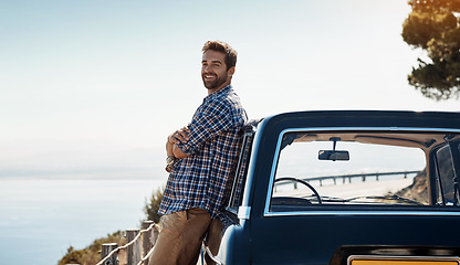Image showing Road trip, travel and portrait of man by car for adventure, summer vacation and holiday on space. Transport mockup, relax and male person in motor vehicle for freedom, journey and happy by ocean