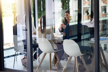 Image showing Meeting, boardroom and collaboration with a business team in a glass office for planning or strategy. Corporate, management and training with an employee group in the workplace for a training seminar