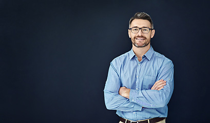 Image showing Portrait, business and man with arms crossed, mockup and employee against dark studio background. Face, male person and entrepreneur with startup success, career and ceo with a smile and professional