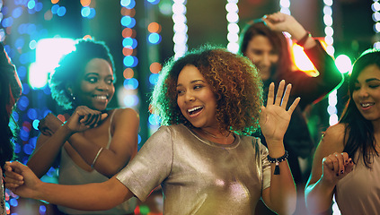 Image showing Happy woman, dance and party in nightclub with friends, social event and new year concert. Dancing group, women and disco celebration with music, night life and crowd for energy, smile and happiness