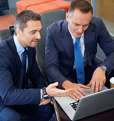 Image showing Laptop, corporate lounge and business people consulting on portfolio review, stock market database or investment. Financial economy, partnership and trader teamwork on forex, bitcoin or nft trading