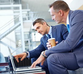 Image showing Laptop, corporate lounge and business people working on portfolio review, stock market or trading investment. Financial economy, partnership and profile of trader point at nft, bitcoin or forex data