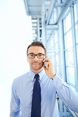 Image showing Corporate, portrait or businessman for phone call for communication, networking or contact in office building. Airport, travel or manager with smartphone for discussion, schedule or conversation