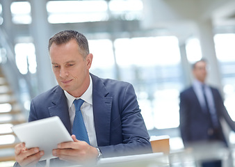 Image showing Focus, corporate and businessman with tablet for networking, finance growth and financial review. CEO, employee and manager in office building planning, data analysis and economy data analytics study