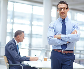 Image showing Portrait, growth and mindset with a business man in his office standing arms crossed in a confident pose. Vision, mission and management with a male employee at work for future success in corporate