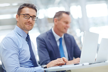 Image showing Laptop, corporate lounge and portrait of business people doing review of financial portfolio, stock market database or investment. Economy, research and team working on forex, bitcoin or nft trading