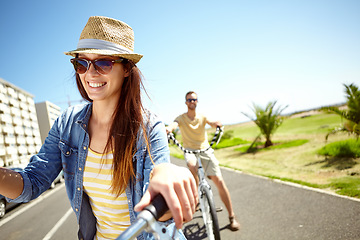 Image showing Love, bicycle travel and couple cycling, happy and enjoy outdoor time together, bond and fun romantic date. Mockup, freedom and bike transport journey for man and woman on summer holiday in Portugal