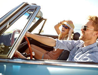 Image showing Car road trip, travel and happy couple laughing on holiday bond adventure, transportation journey or fun summer vacation. Love flare, convertible vehicle and driver driving on Canada countryside tour