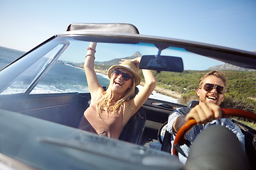 Image showing Car road trip, travel and happy couple on ocean holiday adventure, transportation journey or fun summer vacation. Love bond, convertible automobile and driver driving on Australia countryside tour