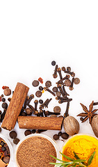 Image showing Table top, powder and food spices in studio isolated on white background mockup. Turmeric seasoning, kitchen condiments and variety of plant herbs in bowls for brunch, healthy diet or cooking flavor.